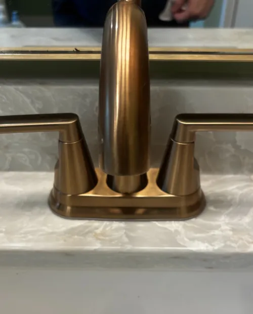 Polished bathroom faucet detail