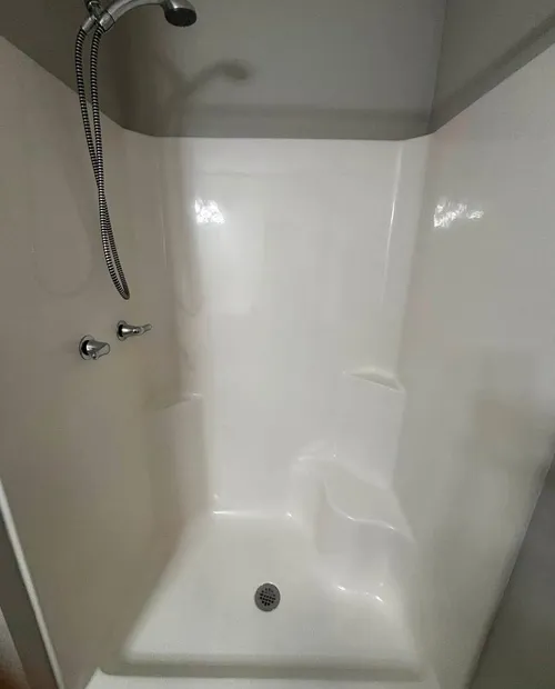 Spotless tub and shower stall, guest and tenant ready