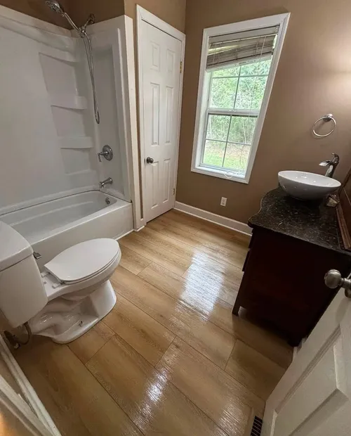 Bright, staged bathroom with vessel sink ready for showings